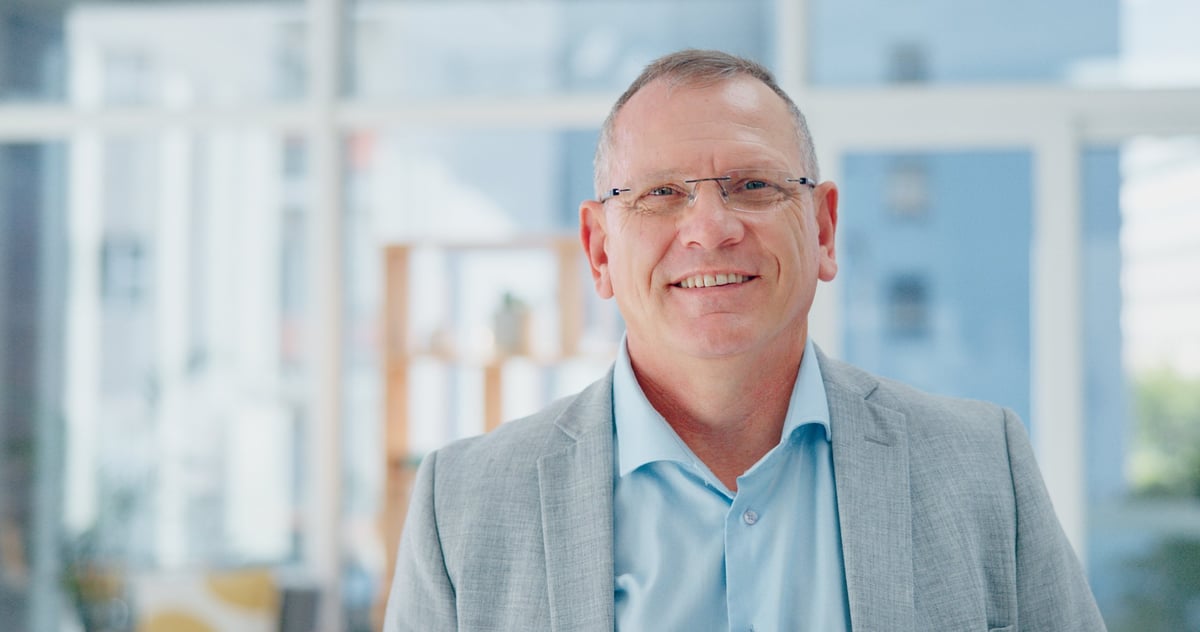 Elderly businessman, face and smile for vision, career ambition or corporate success