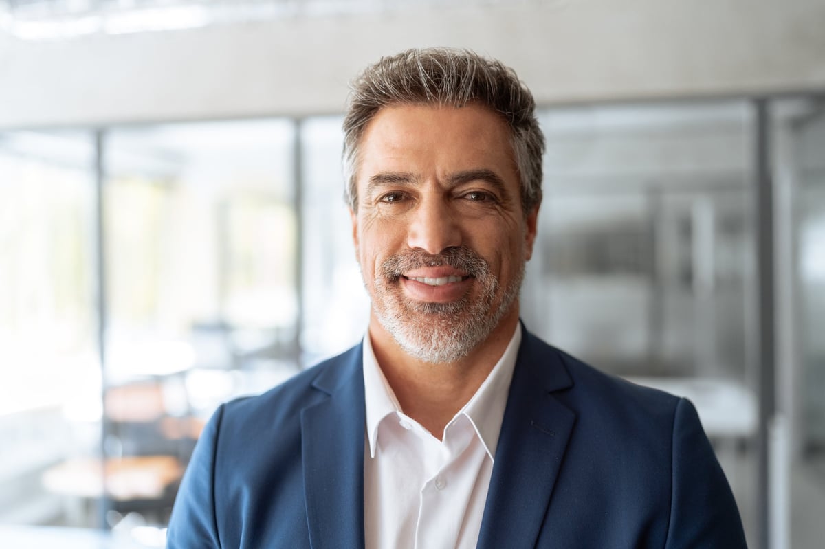 Headshot executive confident senior business man specialist smiling at camera